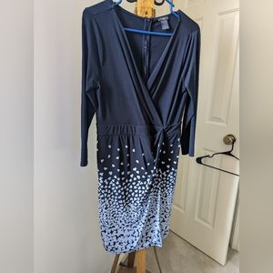 Short navy dress with flower detail on the bottom